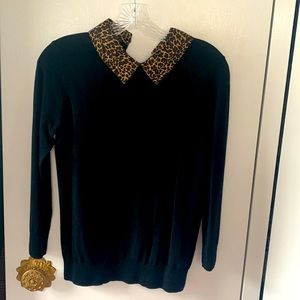 Black sweater with animal print collar